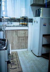 Kuchyň nebo kuchyňský kout v ubytování milimaniluxestay