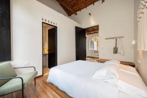 Postel nebo postele na pokoji v ubytování Casamía