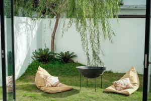 Vườn quanh Canggu villa quite cozy with rooftop and studio