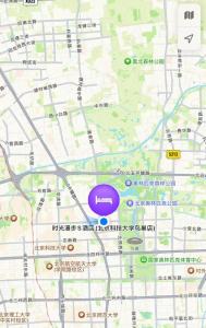 a map with a purple circle on it at Nostalgia S Hotel Beijing National Stadium-Bird's Nest in Beijing