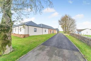 an empty road in front of a house at 5 Bed in Galston oc-s33451 in Galston