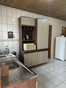 Køkken eller tekøkken på Casa da Lúcia