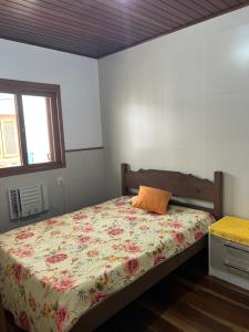 En eller flere senge i et værelse på Casa da Lúcia