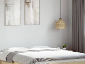 Ένα ή περισσότερα κρεβάτια σε δωμάτιο στο Brevi periodi Reggio Emilia