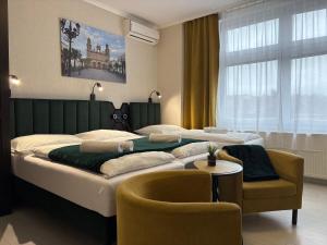 Postel nebo postele na pokoji v ubytování LAS PALMAS ROOMS