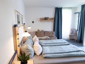 Postel nebo postele na pokoji v ubytování Gästehaus Germania