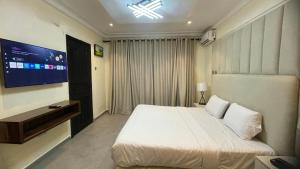 Postel nebo postele na pokoji v ubytování Ivy Homes