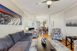 a living room with a couch and a table at Klonteska B5 in Beech Mountain +8 photos