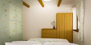Postel nebo postele na pokoji v ubytování Apartmány Lúčny Raj
