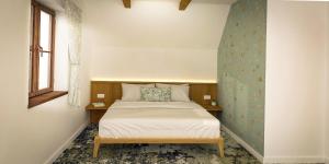 Postel nebo postele na pokoji v ubytování Apartmány Lúčny Raj