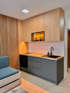 a kitchen with a sink and a counter top at Apartmán nad Dolným Kubínom in Dolný Kubín +13 photos