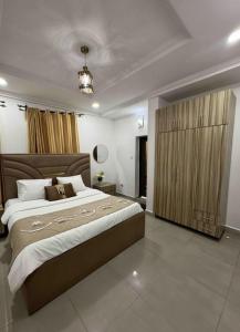 Postelja oz. postelje v sobi nastanitve Luxifair properties Company LTD + 9 fotografij