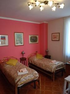 En eller flere senge i et værelse på il Cantuccio