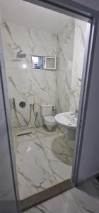 Et badeværelse på Appartement centre ville medenine