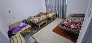 En eller flere senge i et værelse på Appartement centre ville medenine