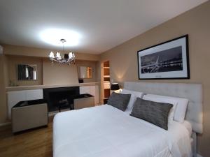 Postel nebo postele na pokoji v ubytování Maitre Hotel Boutique