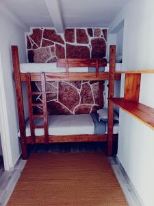 Postel nebo postele na pokoji v ubytování Hostelakis