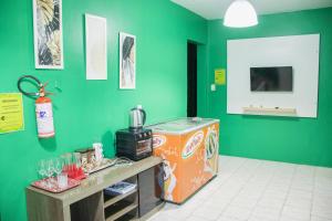 TV a/nebo společenská místnost v ubytování Posada CON PISCINA Y DESAYUNO