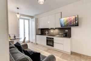 Kuchyň nebo kuchyňský kout v ubytování Domus Sabina + 49 fotografií