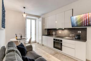 Kuchyň nebo kuchyňský kout v ubytování Domus Sabina