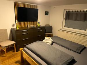 Postel nebo postele na pokoji v ubytování Ferienwohnung Sonnenblick