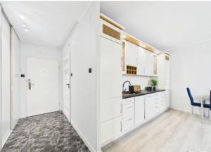 Kuchyň nebo kuchyňský kout v ubytování Apartament Maja