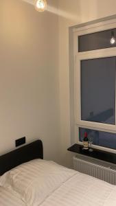 Postel nebo postele na pokoji v ubytování SeaSalt Spa + 7 fotografií