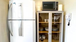 Kuchyň nebo kuchyňský kout v ubytování Vista mar em Caiobá com piscina conforto e localização