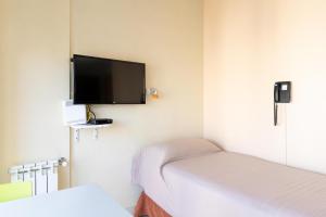 Μια τηλεόραση ή/και κέντρο ψυχαγωγίας στο Le Batiment Apartments