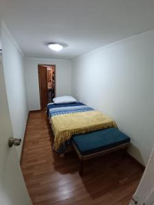 En eller flere senge i et værelse på Hostal poetas de Cartagena