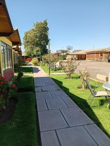 a walkway in the yard of a house at Las Cabañas del Francés in Vallenar +33 photos