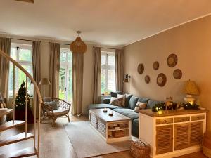 Posezení v ubytování Agapella Apartamenty- Sopot Cottage Ogród 400m od plaży 6 dorosłych i dzieci