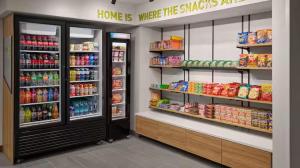 a grocery store aisle with food and drinks at Home 2 Suites by Hilton Frankenmuth in Frankenmuth