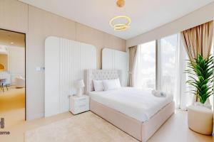 Postel nebo postele na pokoji v ubytování NEXT TO BURJ KHALIFA AND DUBAI MALL + 27 fotografií