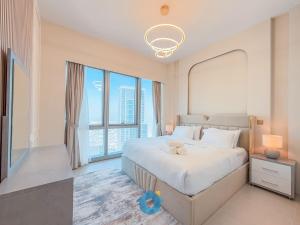 Postel nebo postele na pokoji v ubytování BEST SEA VIEW NEXT TO BURJ KHALIFA AND DUBAI MALL + 25 fotografií