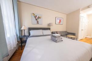 Postel nebo postele na pokoji v ubytování Studio close to Central Park, Lenox Hill & NY Presbyterian