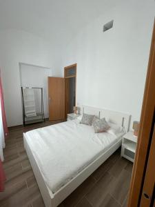 Giường trong phòng chung tại Casa do largo