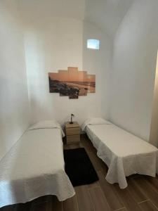 Giường trong phòng chung tại Casa do largo