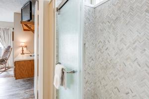 a bathroom with a shower with a glass door at Fire Pit and Boat Dock Lake Chatuge Townhome! in Hiawassee +23 photos