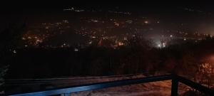 a view of a city at night at Ambient Light apartment Sarajevo with free parking in Sarajevo