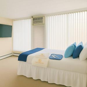 Postel nebo postele na pokoji v ubytování Downtown A2 Gem - Next to Hospitals, Stadium & Restaurants