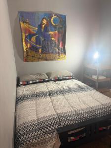 En eller flere senge i et værelse på Hilltop Hostel