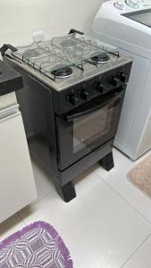 Kuchyň nebo kuchyňský kout v ubytování Casa 2 Suites ,térrea ,