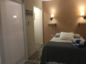 Postel nebo postele na pokoji v ubytování Mini Vacation in Chelem