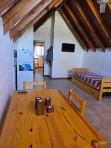 Giường trong phòng chung tại Cabañas Gran Aldea