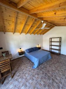 Giường trong phòng chung tại Cabañas Gran Aldea +12 ảnh