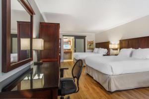 Ένα ή περισσότερα κρεβάτια σε δωμάτιο στο Dry Creek Inn MOD Collection by Sonesta +37 φωτογραφίες