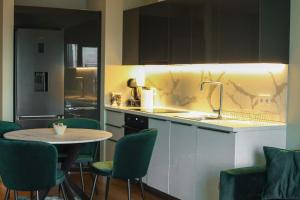 Køkken eller tekøkken på Marble Horizon Skyline