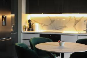 Køkken eller tekøkken på Marble Horizon Skyline