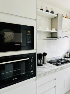 Η κουζίνα ή μικρή κουζίνα στο Casa De Verão